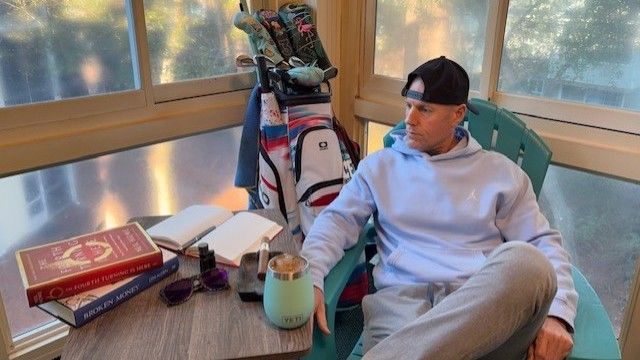 Morning coffee, books, and golf bag on the patio - Freedom Journey Life